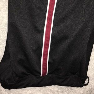 Long pants the sides are white red stripes